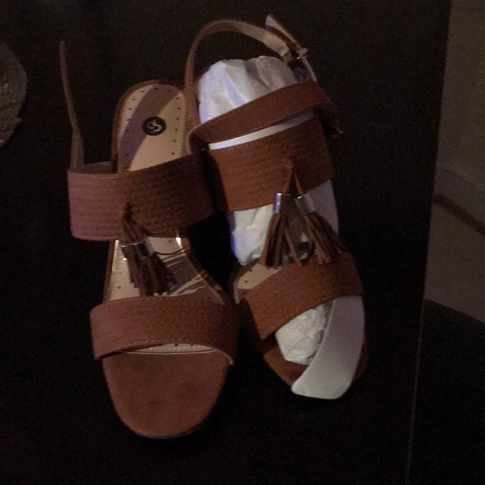 Brown tasselled sandals